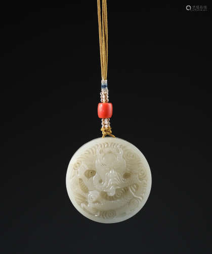 An Imperial Chinese Carved White Jade Dragon Circular Pendent with Inscription