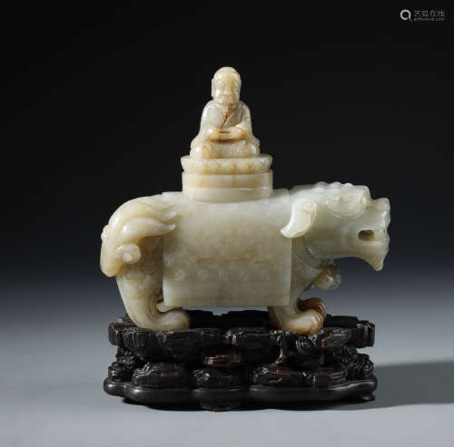 An Exquisite Chinese Carved White Jade Luohan and Zitan Wood Stand