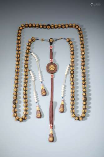 An Imperial Chinese Carved Aloeswood Prayer Necklace with 'Shou' Symbol and Pears Decoratives