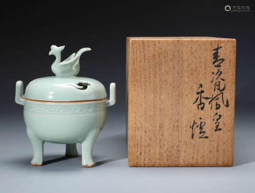 An Exquisite Chinese Celadon Glazed Tripod Censer and Cover with Phoenix Finial