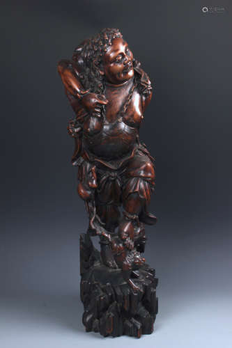 A Chinese Rosewood Figure Of Liuhai
