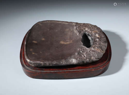 A Large Chinese Carved  Inkstone With Cloud Patterns and Zitan Box