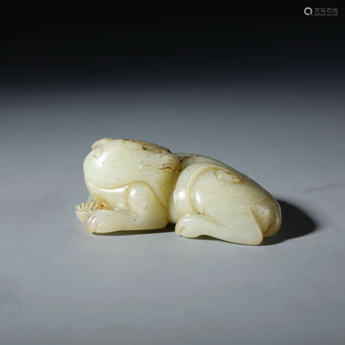 A Chinese Carved White Jade Reclining Mythical Beast
