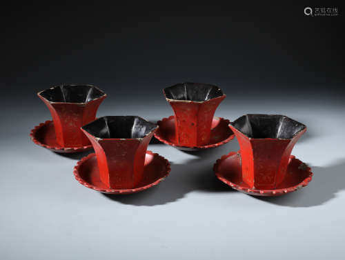 Four Red Lacquered and Gilt Painted High footed Dishes