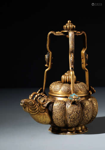 A Rare Chinese Gilt Bronze Long-handled Teapot with Goat-head Spout