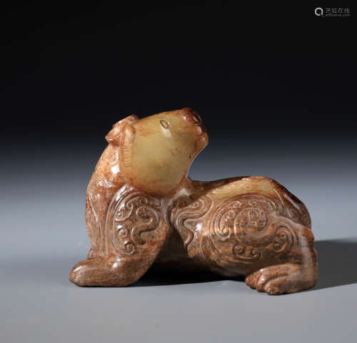 A Chinese Carved Russet Jade Beast
