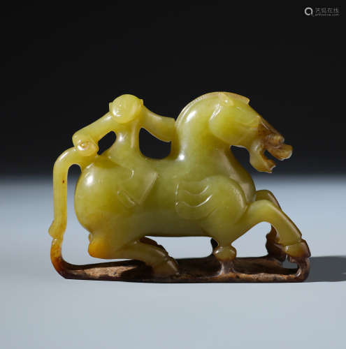 A Fine Chinese Yellow Jade Carving of A Boy Riding A Horse
