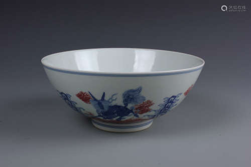 A Chinese Carved Blue and White and Iron Red Bowl, replicate Late Qing