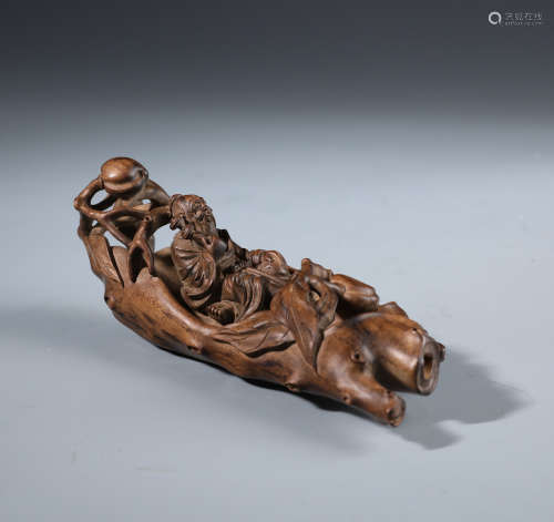 A Rare Chinese Aloeswood Carving of A Scholor on the Boat