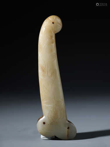 A Fine Chinese White and Russet Jade Dagger Hilt