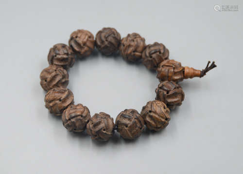 A Chinese Carved Agar-Wood Bracelet