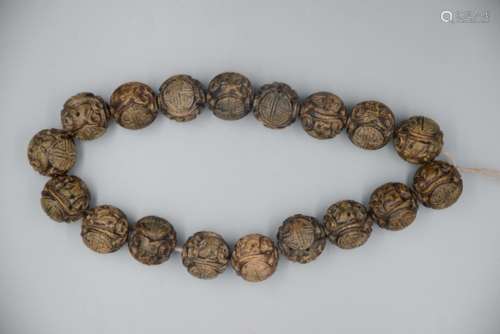 A Chinese Carved Agar-Wood Bracelet