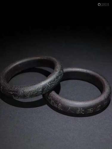 A Pair of Chinese Carved Agar-Wood Bracelet