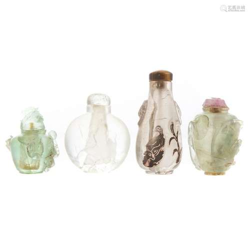 Four Chinese Carved Glass or Stone Snuff Bottles