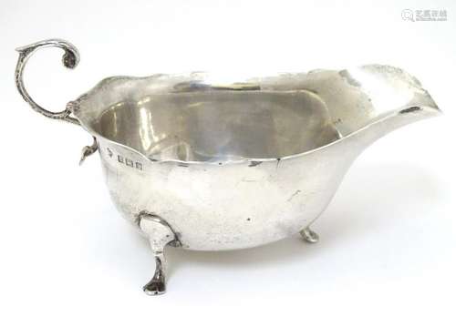 A silver sauce boat hallmarked Birmingham 1907 maker