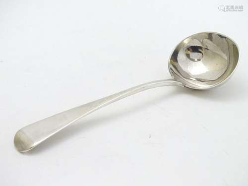 A Victorian silver old English pattern sauce ladle