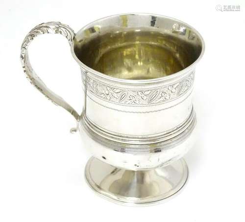 A silver christening mug hallmarked London 1821 maker