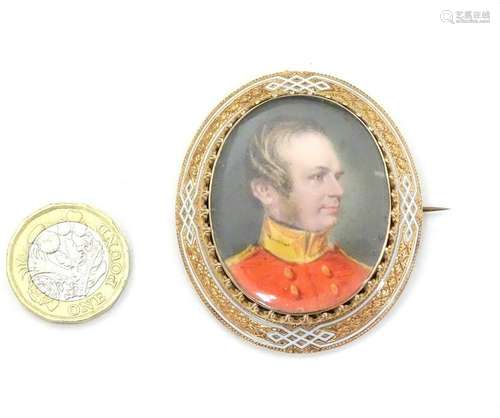 A 19thC gold brooch set with oval portrait miniature