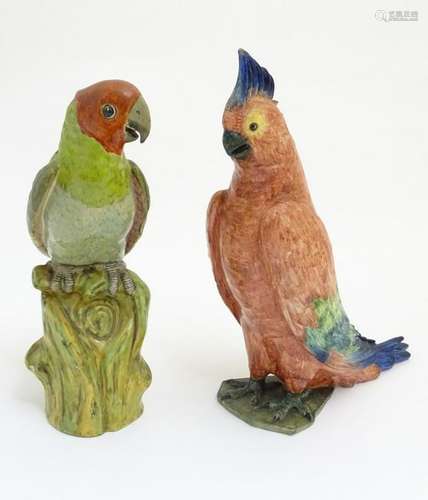 Two ceramic models of exotic birds. One indistinctly