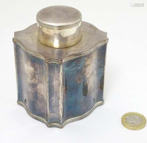 An Old Sheffield Plate tea caddy of serpentine shape.