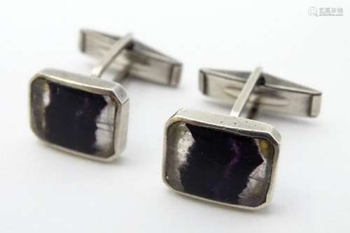 A pair of Sterling Silver cufflink set with Blue John.