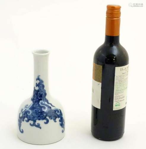 A Chinese blue and white bottle vase with a stylised,