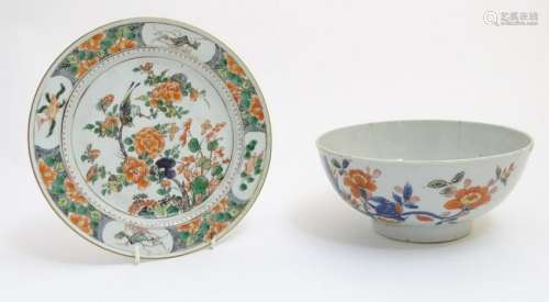 A Chinese Famille Rose plate decorated with flowers,