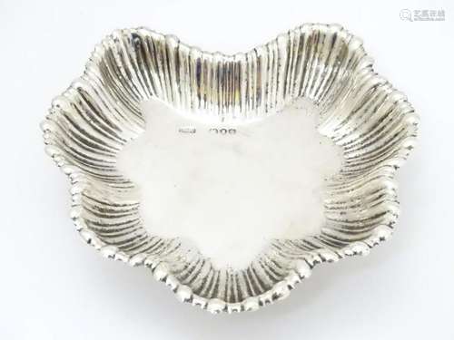 A Victorian silver bon bon dish of leaf form.