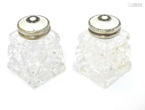 Scandinavian silver : A pair of cut glass pepperettes