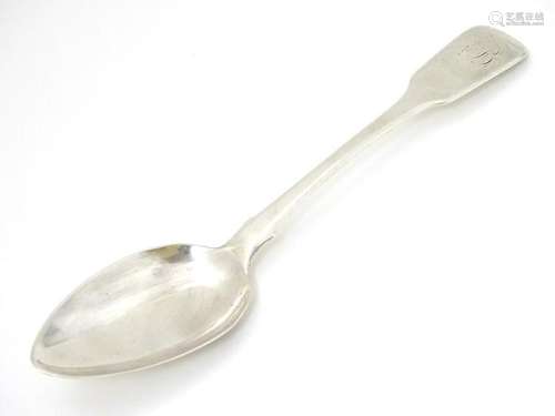 A silver fiddle pattern table spoon hallmarked Exeter