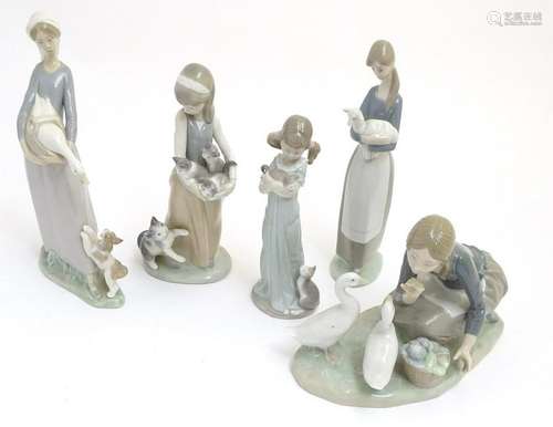 A quantity of Lladro figures to include, 'Feeding the