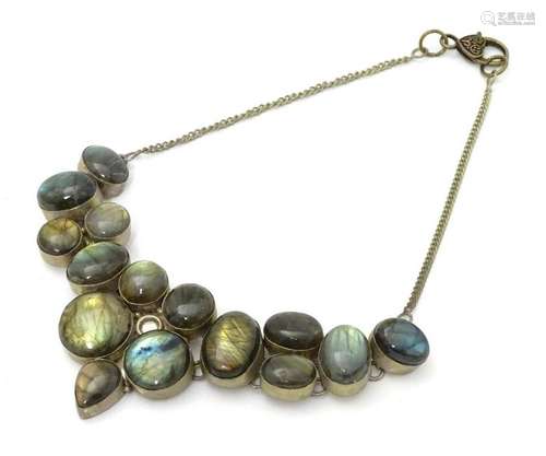 A necklace set with labrodite cabochon. Approx 6'' long