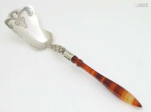 A Dutch silver spoon with shovel formed bowl and shaped