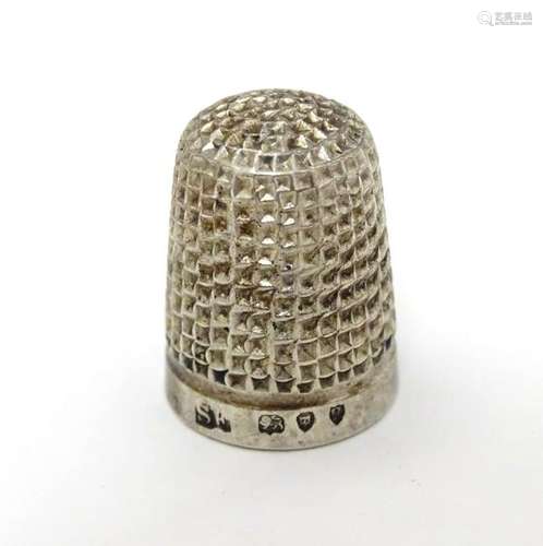 A Victorian silver thimble hallmarked London 1892 maker