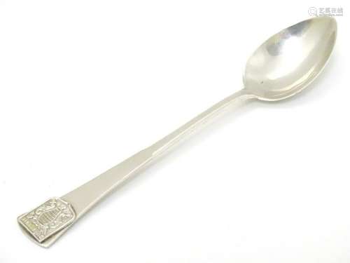 A Continental silver souvenir teaspoon with coat of