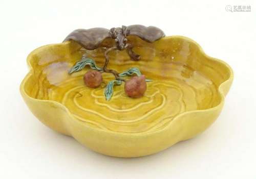 A Chinese wavy edged yellow brush wash dish with bat