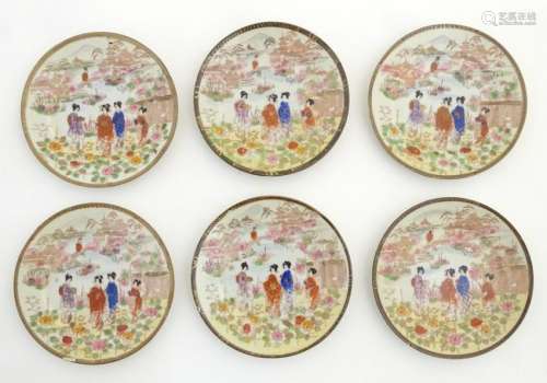 Six Japanese plates depicting figures in traditional