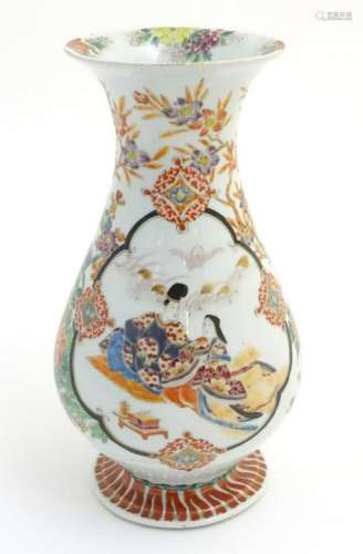 A Japanese baluster vase with a flared foot and rim,