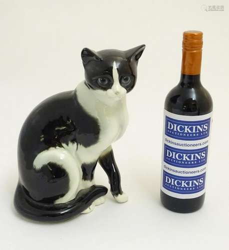 A Goebel ceramic figurine of a black and white cat,