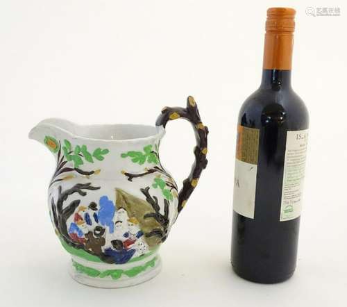 A 19thC Staffordshire Pottery Pratt style jug,