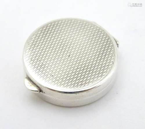 A silver pill box of circular form  1 ?'' diameter