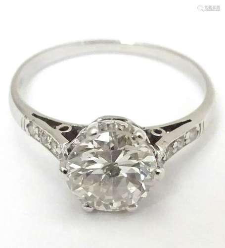 An 18ct white gold ring set with diamond solitaire