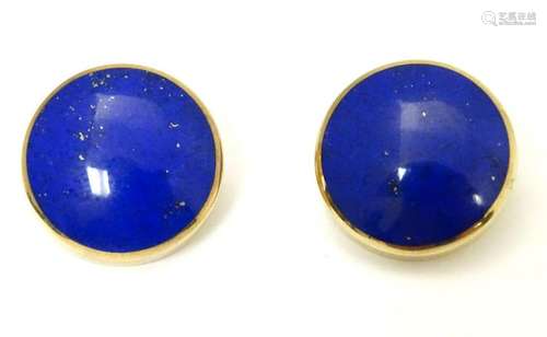 A pair of 9ct gold clip earrings set with lapiz lazuli