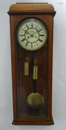 An early XX Vienna wall clock: an 8 day, oak cased