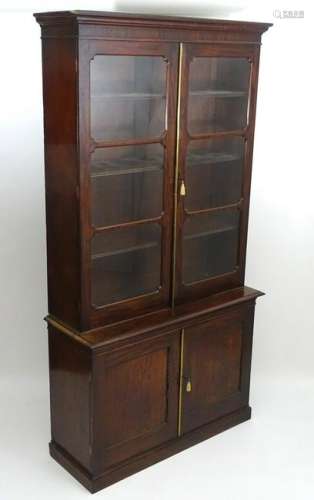 A large William IV mahogany bookcase, with a moulded