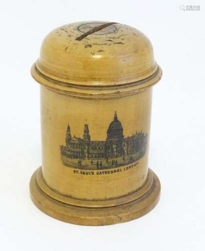 Mauchline: a domed shaped green money box, decorated