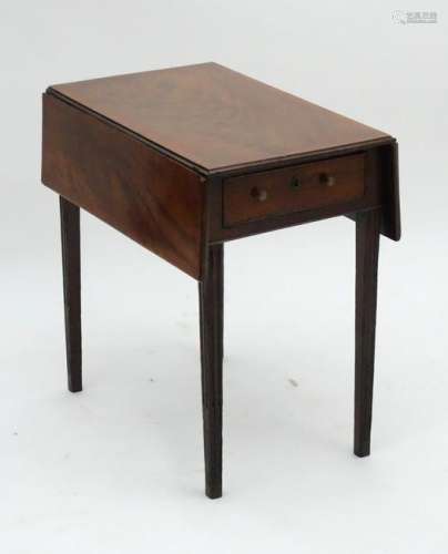 A Regency Pembroke table with a rectangular crossbanded