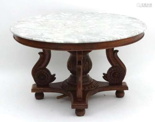 A mid 20thC marble topped continental table, with four