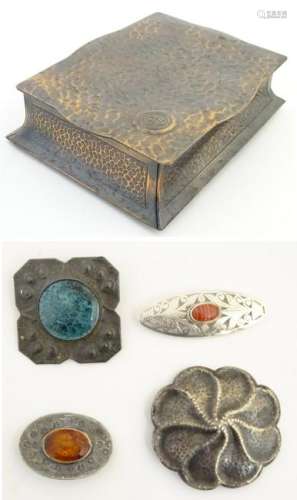 An Arts and Crafts embossed tin box containing 4