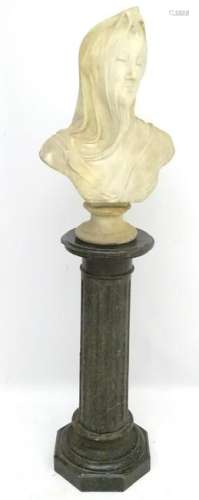 A 19thC fluted granite column and base surmounted by a